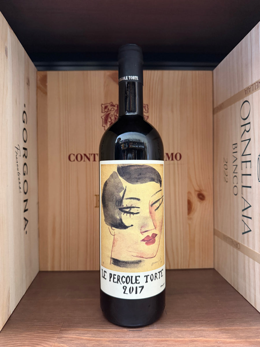 Vetro di Montervertine Pergole Torte 2017 di Enoteche Toscane, bottiglia di vino rosso con etichetta dettagliata.