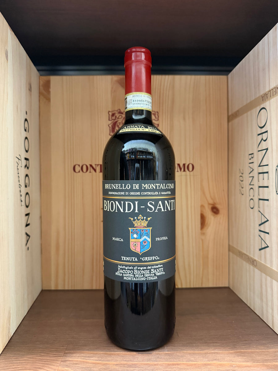 Bottiglia di Brunello di Montalcino 2011 Biondi Santi, vino rosso toscano in bottiglia con etichetta elegante