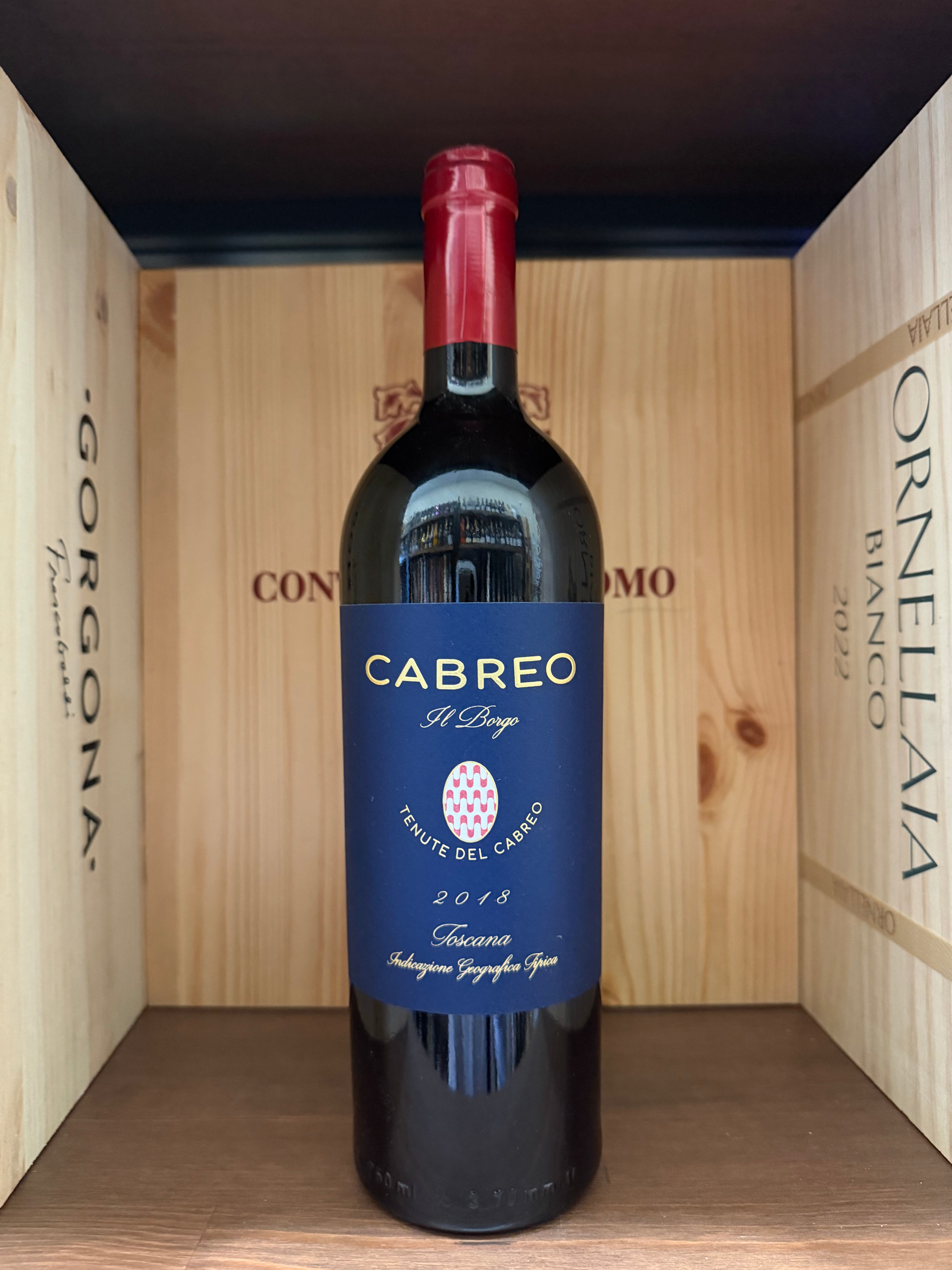 Bottiglia di vino rosso Cabreo il Borgo 2018 di Enoteche Toscane, con etichetta elegante e dettaglio della bottiglia.