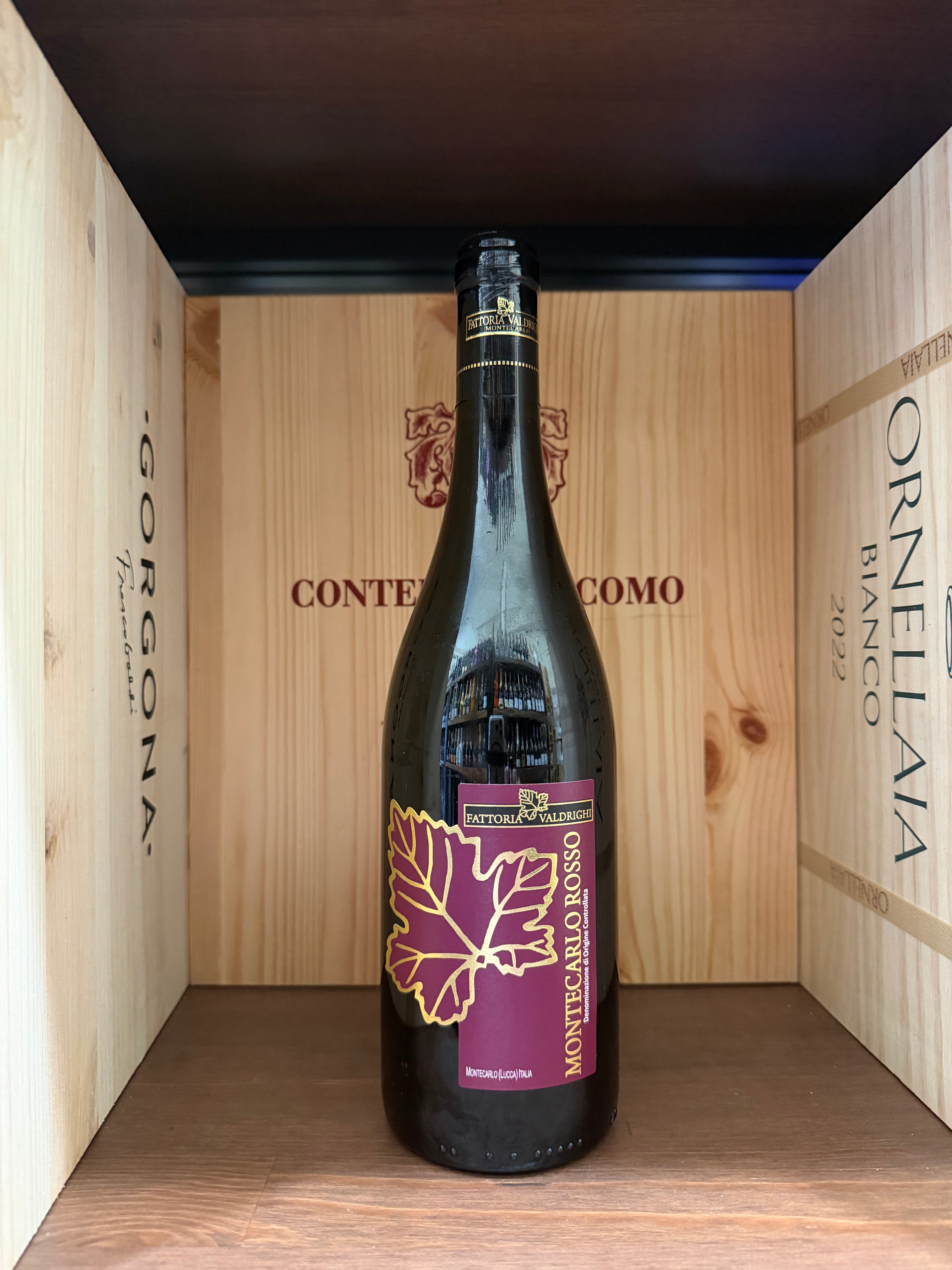 Bottiglia di Montecarlo Rosso Fattoria Valdrighi 2025, vino rosso toscano in bottiglia con etichetta elegante.