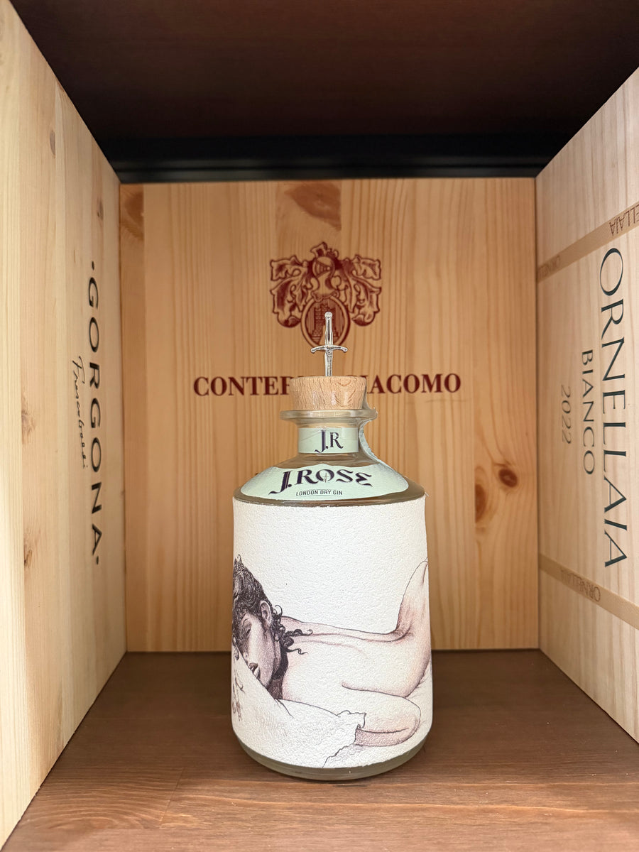 Bottiglia di Gin J.Rose London Dry Gin di Enoteche Toscane, con etichetta elegante e design distintivo sullo sfondo.