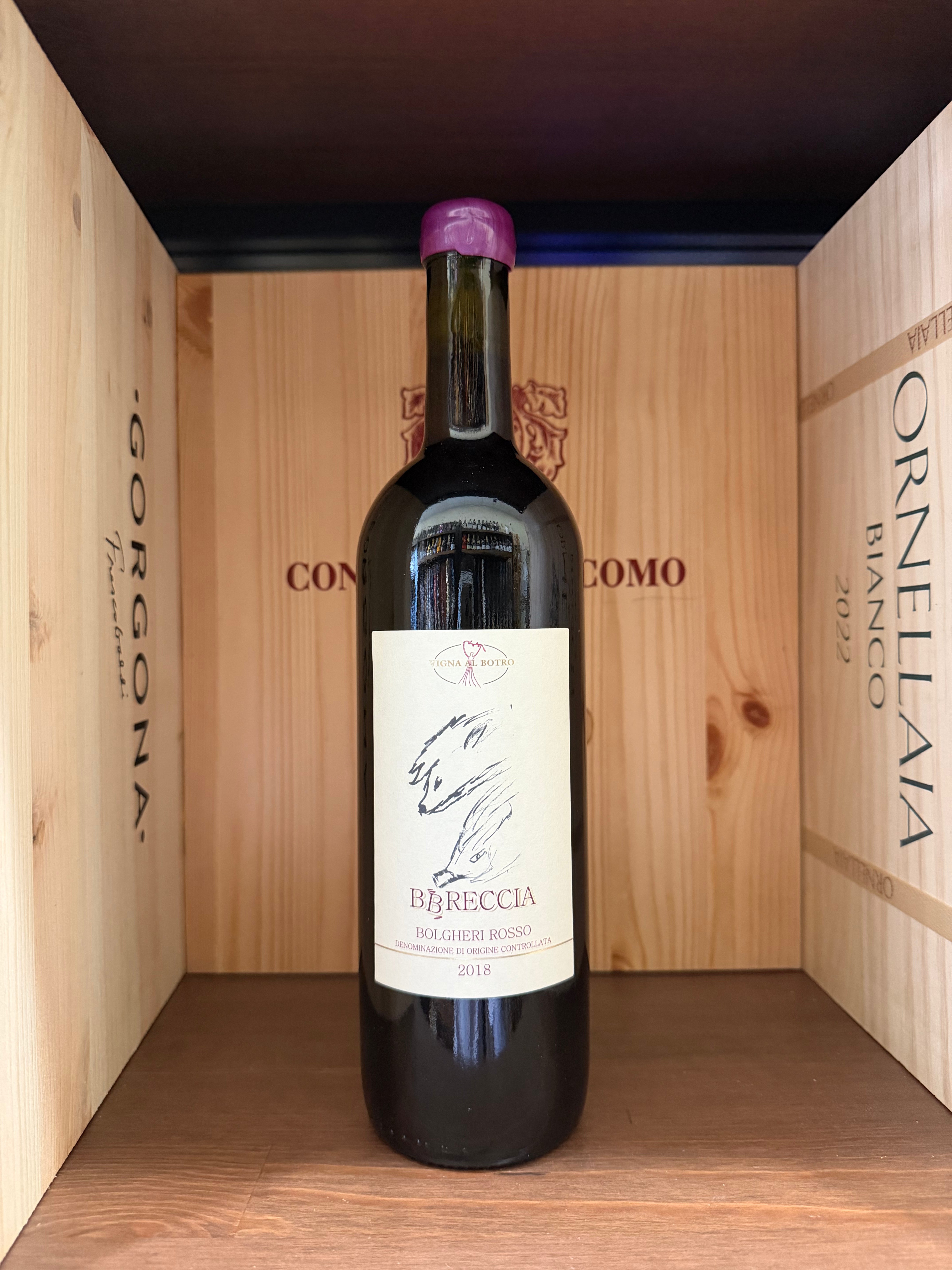 Bottiglia di vino rosso BBreccia Bolgheri 2018 di Enoteche Toscane, con etichetta elegante e dettaglio della capsula.