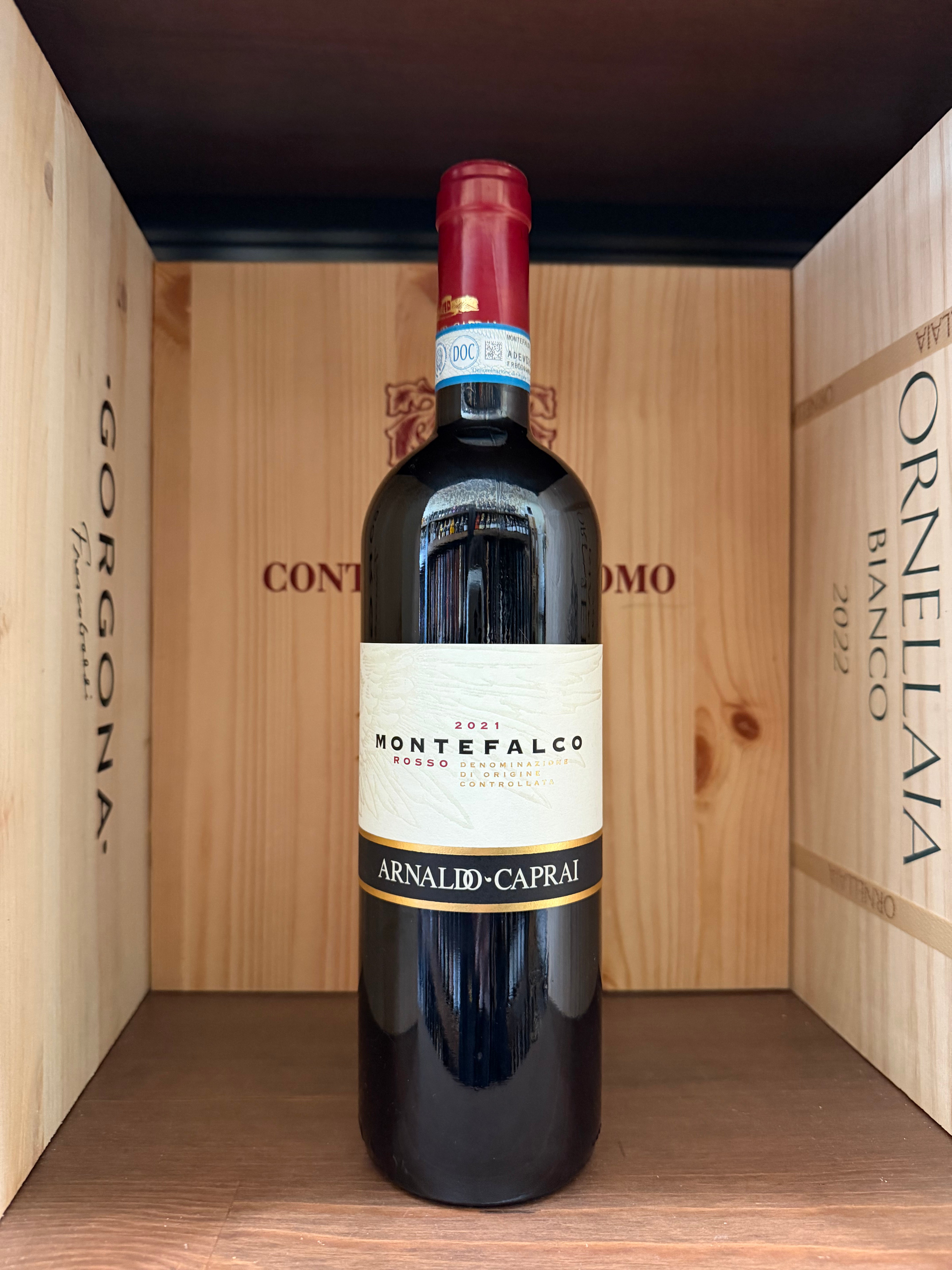 Bottiglia di vino Montefalco 2021 Arnaldo Caprai, cantina Enoteche Toscane, con etichetta elegante e dettagli del tappo.