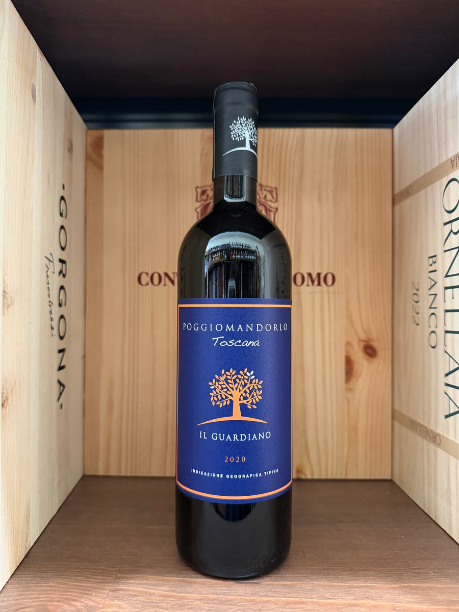 Bottiglia di vino Il Guardiano 2020 Poggiomandorlo di Enoteche Toscane, etichetta elegante e dettagliata visibile in primo piano.