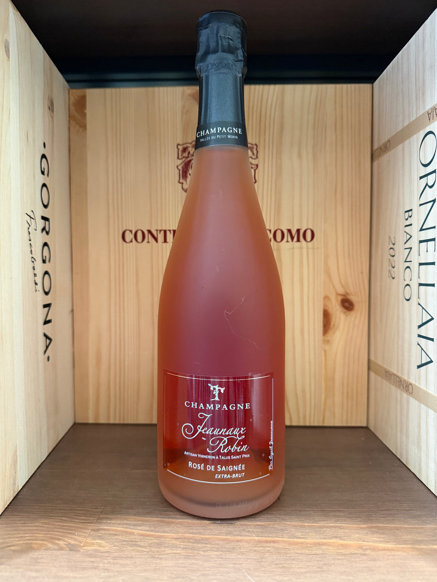 Calice di vino rosato Robin ROSé DE Saignée Extra Brut 2021 di Jeaunaux, con etichetta e dettaglio della bottiglia.