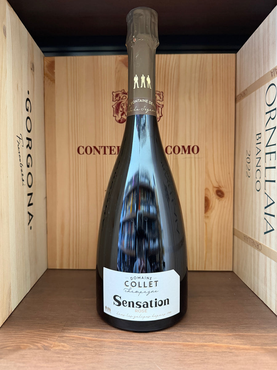 Bottiglia di Domaine Collet Sensation Rosé Extra Brut 2017, vino spumante rosato, con etichetta elegante e dettagli visibili