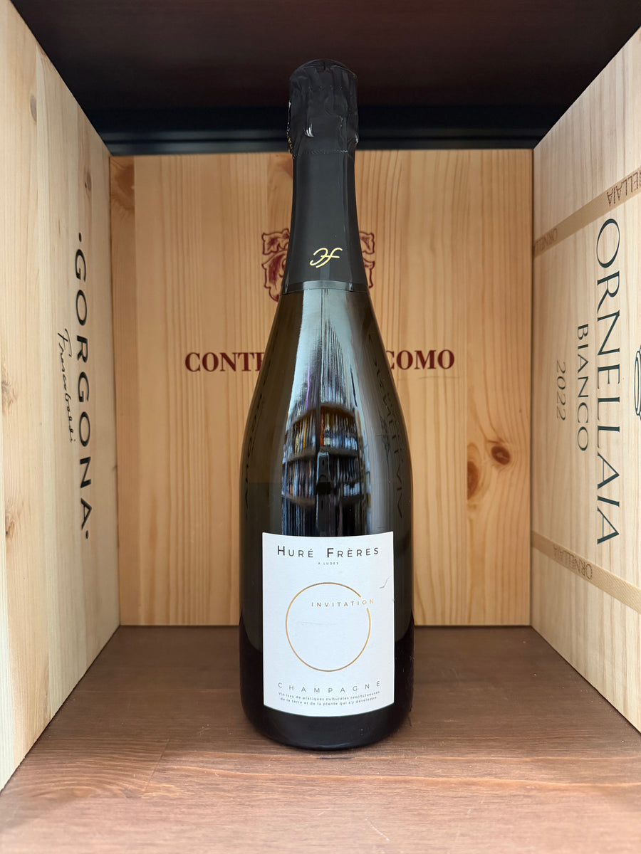 Invito Huré Fréres Enoteche Toscane, elegante design con dettagli dorati e testo impressi su carta di alta qualità.